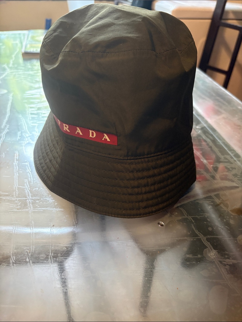 Prada Olive Bucket Hat with Red Logo Patch